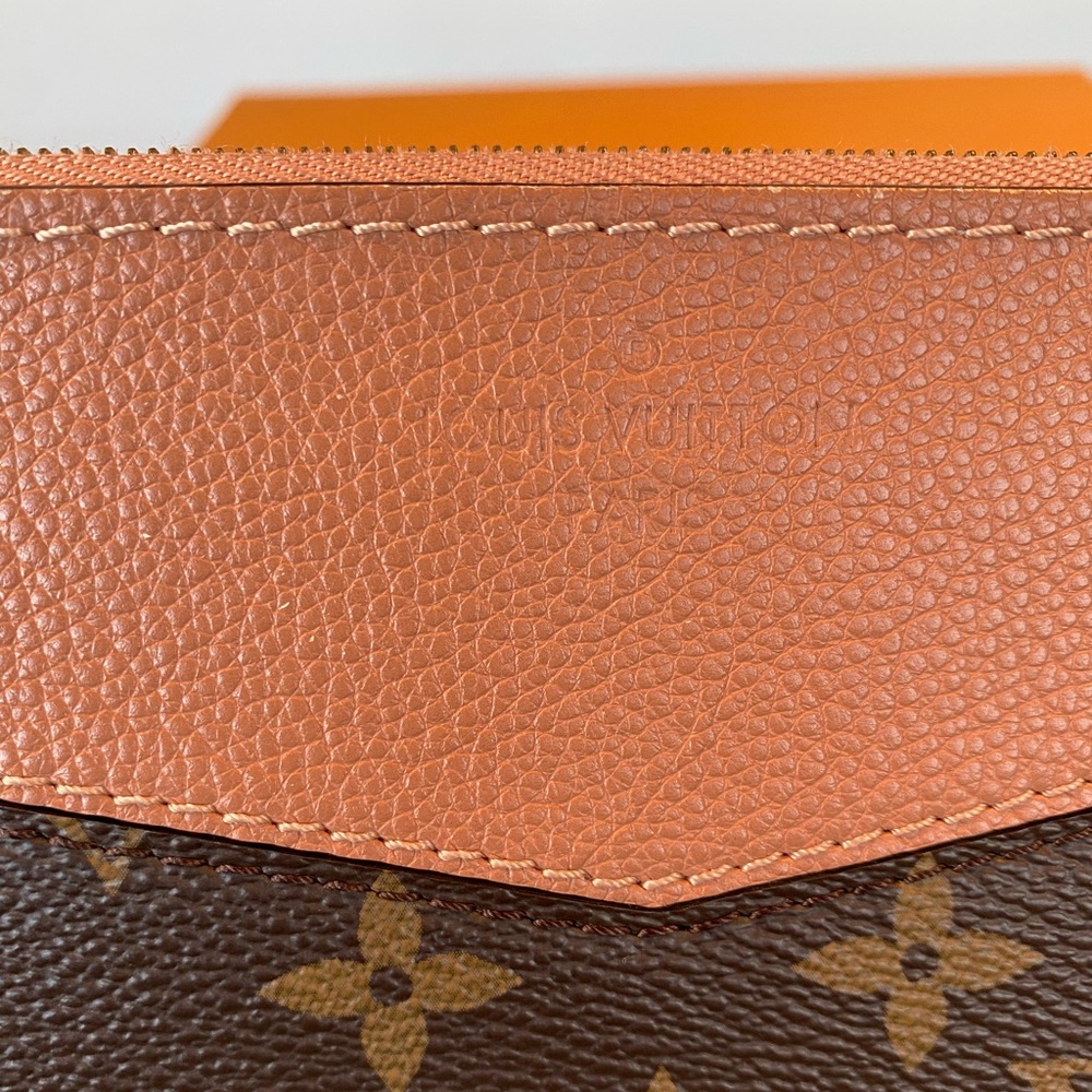 Authentic Louis Vuitton Daily Pouch Peach (rare color) Clutch - Picture 2 of 14